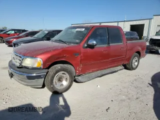 2002 Ford F-150 XLT with VIN 1FTRW076X2KE22865, listed as a Copart auction lot 74739004 with 0 mi miles and Salvage Title. Bid and sale history available at carsss.com. Image 1.