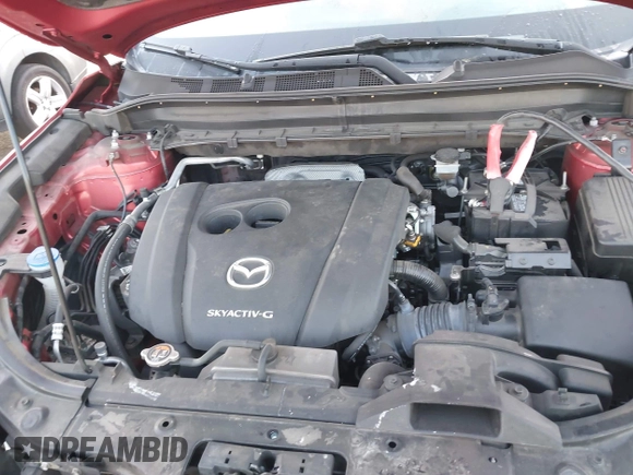 2020 Mazda CX-5 Touring z VIN JM3KFACM1L0855474, wystawiony jako IAAI lot #42004504 z przebiegiem 82 505 mil mil oraz . Historia ofert i sprzedaży dostępna na DreamBid. Obrazek 10.
