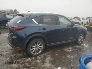 2021 Mazda CX-5 Grand Touring with VIN JM3KFBDM0M0391325, listed as a Copart auction lot 44863215 with 21,997 mi miles and Salvage Title. Bid and sale history available at DreamBid. Image 3.
