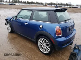 2007 MINI Hardtop S with VIN WMWMF735X7TT80244, listed as a Copart auction lot 46060635 with 116,032 mi miles and Salvage Title. Bid and sale history available at DreamBid. Image 2.