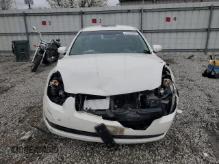 2004 Nissan Maxima SL with VIN 1N4BA41E74C824398, listed as a Copart auction lot 51312995 with 143,549 mi miles and Salvage Title. Bid and sale history available at DreamBid. Image 5.