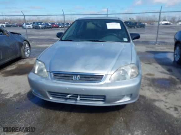 1999 Honda Civic VP with VIN 2HGEJ6615XH528453, listed as a IAAI auction lot 41655363 with 163,816 mi miles. Bid and sale history available at carsss.com. Image 6.