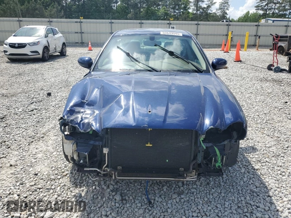 2004 Jaguar X-Type with VIN SAJEA51C44WD83361, listed as a Copart auction lot 55643545 with 54,615 mi miles and Salvage Title. Bid and sale history available at DreamBid. Image 5.