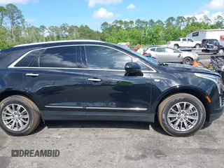 2017 Cadillac XT5 Luxury FWD z VIN 1GYKNBRS0HZ116875, wystawiony jako IAAI lot #42155840 z przebiegiem 47 625 mil mil oraz . Historia ofert i sprzedaży dostępna na DreamBid. Obrazek 13.