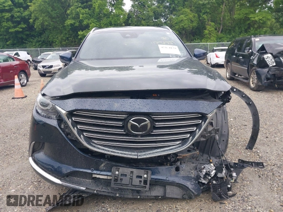 2021 Mazda CX-9 Carbon Edition z VIN JM3TCBDY7M0536005, wystawiony jako IAAI lot #42424129 z przebiegiem 48 005 mil mil oraz . Historia ofert i sprzedaży dostępna na DreamBid. Obrazek 13.