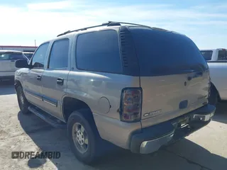 2001 Chevrolet Tahoe LS z VIN 1GNEC13T61R208266, wystawiony jako IAAI lot #41370967 z przebiegiem 378 105 mil mil oraz . Historia ofert i sprzedaży dostępna na DreamBid. Obrazek 3.