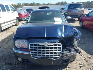 2005 Chrysler 300 with VIN 2C3JA63HX5H654114, listed as a IAAI auction lot 41469161 with 136,104 mi miles. Bid and sale history available at carsss.com. Image 13.