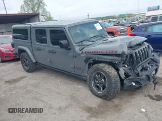 2021 Jeep Gladiator Rubicon z VIN 1C6JJTBG8ML619972, wystawiony jako IAAI lot #42057805 z przebiegiem 37 875 mil mil oraz . Historia ofert i sprzedaży dostępna na DreamBid. Obrazek 1.