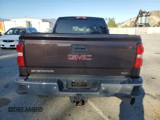 2016 GMC Sierra 2500HD SLT z VIN 1GT12TE80GF160336, wystawiony jako Copart lot #45910795 z przebiegiem 124 655 mil mil oraz Szkoda całkowita • Salvage title. Historia ofert i sprzedaży dostępna na DreamBid. Obrazek 6.