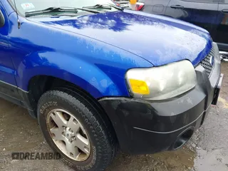 2005 Ford Escape XLT with VIN 1FMCU93125KA41795, listed as a IAAI auction lot 41931869 with 156,421 mi miles and . Bid and sale history available at DreamBid. Image 6.