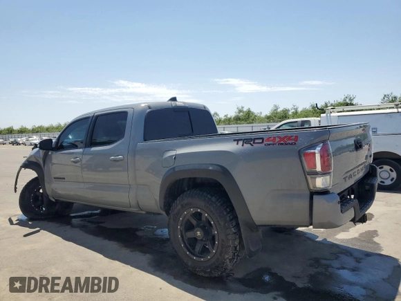 2020 Toyota Tacoma SR5 z VIN 3TMDZ5BN0LM094976, wystawiony jako Copart lot #58695515 z przebiegiem 84 025 mil mil oraz Czysty tytuł • Clean title. Historia ofert i sprzedaży dostępna na DreamBid. Obrazek 2.