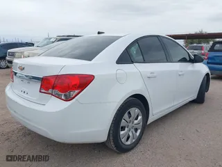 2014 Chevrolet Cruze LS with VIN 1G1PB5SGXE7139849, listed as a IAAI auction lot 41534179 with 99,507 mi miles. Bid and sale history available at carsss.com. Image 4.