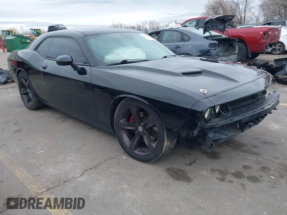 2015 Dodge Challenger R/T with VIN 2C3CDZATXFH712765, listed as a IAAI auction lot 41817210 with 99,535 mi miles and . Bid and sale history available at DreamBid. Image 1.