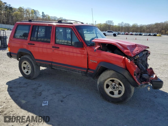 1995 Jeep Cherokee Sport with VIN 1J4FJ68S2SL666126, listed as a Copart auction lot 50496735 with 158,523 mi miles and Salvage title. Bid and sale history available at DreamBid. Image 4.