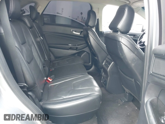 2020 Ford Edge Titanium z VIN 2FMPK4K95LBA16379, wystawiony jako IAAI lot #41190704 z przebiegiem 69 076 mil mil oraz . Historia ofert i sprzedaży dostępna na DreamBid. Obrazek 8.