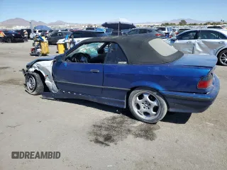 1998 BMW 3 Series 323ic with VIN WBABJ7321WEA16988, listed as a Copart auction lot 73016994 with 146,818 mi miles and Salvage Title. Bid and sale history available at carsss.com. Image 2.