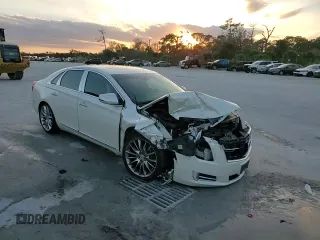 2014 Cadillac XTS Platinum z VIN 2G61W5S84E9153242, wystawiony jako Copart lot #88361685 z przebiegiem 141 401 mil mil oraz Szkoda całkowita • Salvage title. Historia ofert i sprzedaży dostępna na DreamBid. Obrazek 13.