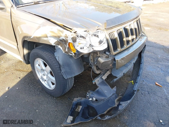 2009 Jeep Grand Cherokee Laredo with VIN 1J8GS48K79C516320, listed as a IAAI auction lot 41353131 with 166,739 mi miles. Bid and sale history available at carsss.com. Image 6.