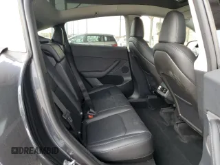 2025 Tesla Model Y Long Range with VIN 7SAYGDED8SF218700, listed as a Copart auction lot 84720474 with 1,832 mi miles and Salvage Title. Bid and sale history available at DreamBid. Image 11.