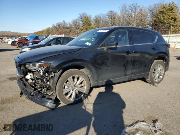 2023 Mazda CX-5 Signature with VIN JM3KFBXYXP0130139, listed as a Copart auction lot 88321445 with 22,911 mi miles and Salvage Title. Bid and sale history available at carsss.com. Image 1.