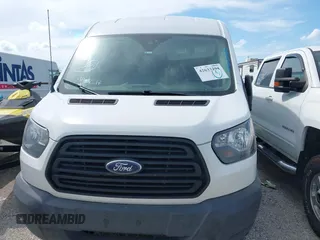 2019 Ford Transit with VIN 1FTYR2CM3KKB86806, listed as a IAAI auction lot 42633294 with 148,555 mi miles and . Bid and sale history available at DreamBid. Image 12.