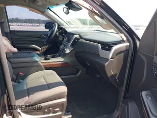 2016 GMC Yukon XL SLE with VIN 1GKS1FKC9GR161876, listed as a IAAI auction lot 39948106 with 60,800 mi miles. Bid and sale history available at carsss.com. Image 5.