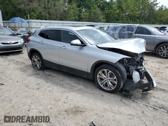 2018 BMW X2 sDrive28i with VIN WBXYJ3C39JEJ82814, listed as a Copart auction lot 59498615 with 74,550 mi miles and Salvage title. Bid and sale history available at DreamBid. Image 4.