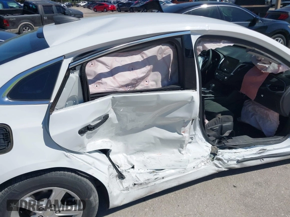 2020 Chevrolet Malibu LS with VIN 1G1ZB5STXLF012642, listed as a IAAI auction lot 41777011 with 69,100 mi miles and . Bid and sale history available at DreamBid. Image 6.