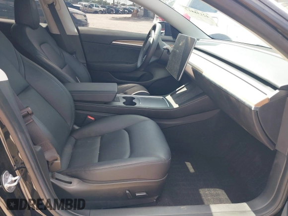 2023 Tesla Model 3 z VIN 5YJ3E1EA0PF571330, wystawiony jako IAAI lot #42198817 z przebiegiem 39 682 mil mil oraz . Historia ofert i sprzedaży dostępna na DreamBid. Obrazek 5.