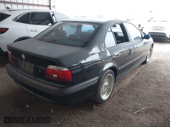 1998 BMW 5 Series 528i z VIN WBADD6325WBW34033, wystawiony jako IAAI lot #41025167 z przebiegiem Nie podano mil oraz . Historia ofert i sprzedaży dostępna na DreamBid. Obrazek 4.