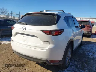 2020 Mazda CX-5 Grand Touring with VIN JM3KFADM5L1815374, listed as a IAAI auction lot 41416077 with 44,190 mi miles. Bid and sale history available at carsss.com. Image 4.