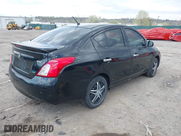 2014 Nissan Versa SV with VIN 3N1CN7AP7EL811097, listed as a IAAI auction lot 42051169 with 121,761 mi miles. Bid and sale history available at carsss.com. Image 4.