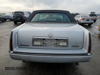 1994 Cadillac Concours z VIN 1G6KF52Y3RU231877, wystawiony jako Copart lot #82150174 z przebiegiem 76 279 mil mil oraz Szkody całkowita. Historia ofert i sprzedaży dostępna na DreamBid. Obrazek 6.