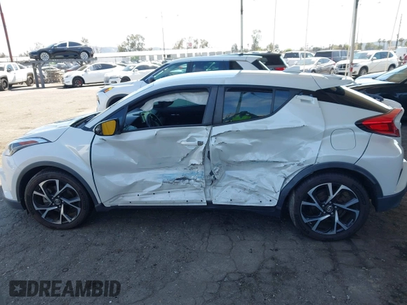 2018 Toyota C-HR XLE with VIN NMTKHMBX9JR022921, listed as a IAAI auction lot 41858651 with 50,448 mi miles. Bid and sale history available at carsss.com. Image 13.
