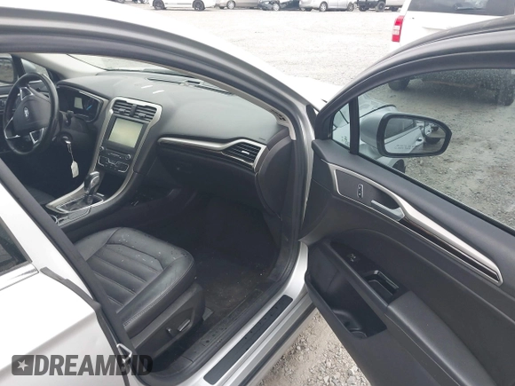 2016 Ford Fusion SE with VIN 3FA6P0H97GR258850, listed as a IAAI auction lot 41838546 with 124,244 mi miles and . Bid and sale history available at carsss.com. Image 5.