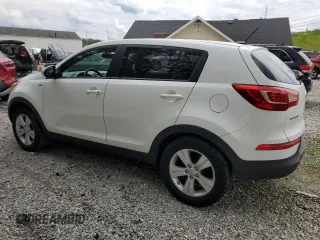 2013 Kia Sportage LX with VIN KNDPBCA20D7501980, listed as a Copart auction lot 61784015 with 140,793 mi miles and Salvage title. Bid and sale history available at DreamBid. Image 2.