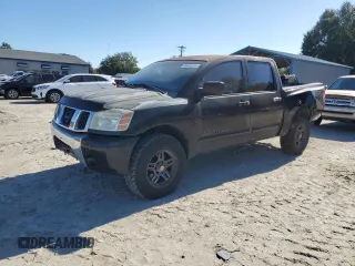 2006 Nissan Titan SE z VIN 1N6BA07B96N531980, wystawiony jako Copart lot #84666294 z przebiegiem 174 754 mil mil oraz Szkoda całkowita • Salvage title. Historia ofert i sprzedaży dostępna na DreamBid. Obrazek 1.