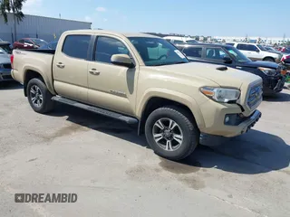 2017 Toyota Tacoma SR5 z VIN 5TFAZ5CN6HX040519, wystawiony jako IAAI lot #42099815 z przebiegiem 141 907 mil mil oraz . Historia ofert i sprzedaży dostępna na DreamBid. Obrazek 1.
