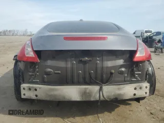 2012 Nissan 370Z с VIN JN1AZ4EH6CM562615, выставлен на аукционе Copart как лот 47623125 с пробегом 86 468 миль миль и Списание • Salvage title. История ставок и продаж доступна на DreamBid. Изображение 6.