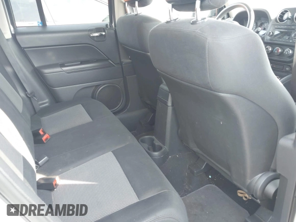 2012 Jeep Patriot Sport with VIN 1C4NJRBB9CD593909, listed as a IAAI auction lot 42715315 with 110,824 mi miles and . Bid and sale history available at DreamBid. Image 8.