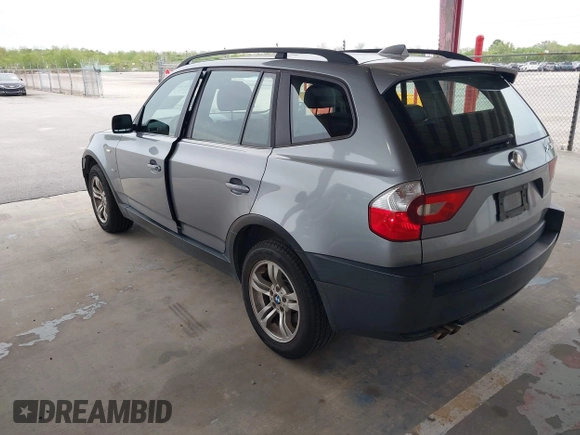 2005 BMW X3 3.0i with VIN WBXPA93495WD18319, listed as a IAAI auction lot 41906633 with 185,090 mi miles. Bid and sale history available at carsss.com. Image 3.