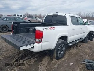 2017 Toyota Tacoma SR5 with VIN 3TMCZ5AN3HM106655, listed as a IAAI auction lot 41838777 with 63,740 mi miles and . Bid and sale history available at DreamBid. Image 4.
