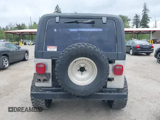 1994 Jeep Wrangler z VIN 1J4FY29S7RP474769, wystawiony jako IAAI lot #42283575 z przebiegiem 154 422 mil mil oraz . Historia ofert i sprzedaży dostępna na DreamBid. Obrazek 16.