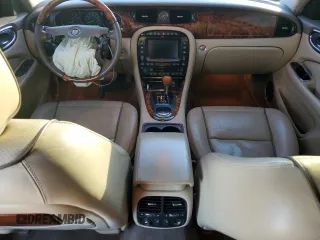 2008 Jaguar XJ Vanden Plas with VIN SAJWA82B18SH28807, listed as a Copart auction lot 42571155 with 97,548 mi miles and Salvage Title. Bid and sale history available at carsss.com. Image 8.