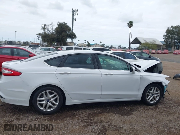2016 Ford Fusion SE with VIN 3FA6P0H74GR385232, listed as a IAAI auction lot 42035002 with 88,211 mi miles and . Bid and sale history available at DreamBid. Image 13.
