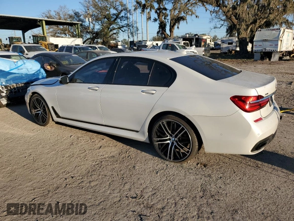 2016 BMW 7 Series 750i xDrive with VIN WBA7B0C59GG526741, listed as a Copart auction lot 86312384 with 90,360 mi miles and Salvage title. Bid and sale history available at DreamBid. Image 2.