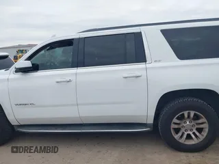 2015 GMC Yukon XL SLT with VIN 1GKS1HKCXFR652337, listed as a IAAI auction lot 41330287 with 139,268 mi miles. Bid and sale history available at carsss.com. Image 15.