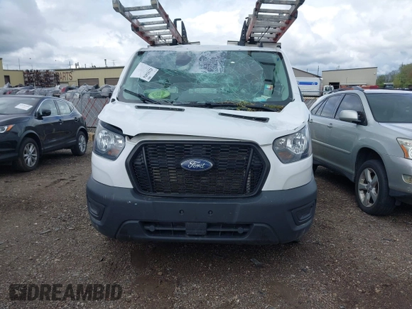 2021 Ford Transit Cargo z VIN 1FTYE1Y86MKA71783, wystawiony jako IAAI lot #42183454 z przebiegiem 53 405 mil mil oraz . Historia ofert i sprzedaży dostępna na DreamBid. Obrazek 12.