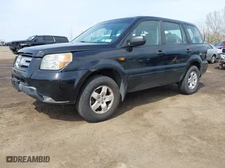 2007 Honda Pilot LX with VIN 5FNYF28117B044692, listed as a IAAI auction lot 42081205 with 173,744 mi miles. Bid and sale history available at carsss.com. Image 2.