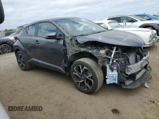 2018 Toyota C-HR XLE with VIN NMTKHMBX0JR042667, listed as a Copart auction lot 54173255 with 50,395 mi miles and Salvage Title. Bid and sale history available at carsss.com. Image 4.